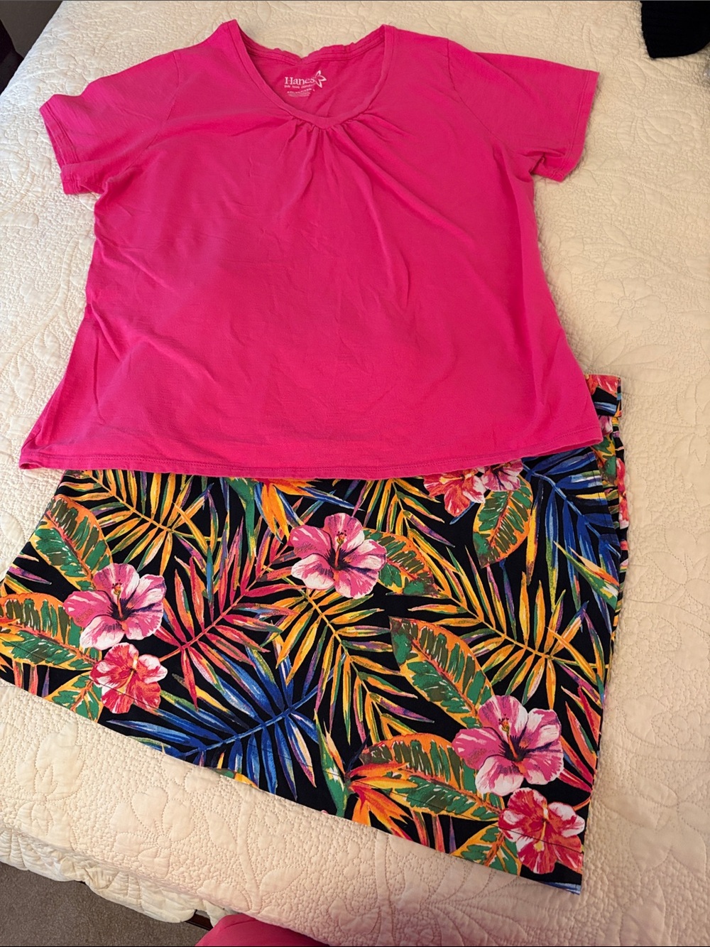 2-piece set. Rafaella glowered tropical skort and Hanes Hot Pink V-Neck Tee